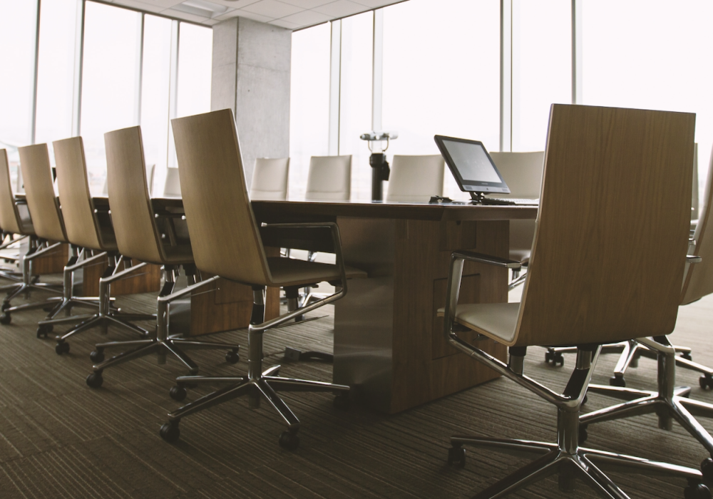 board room with empty chairs