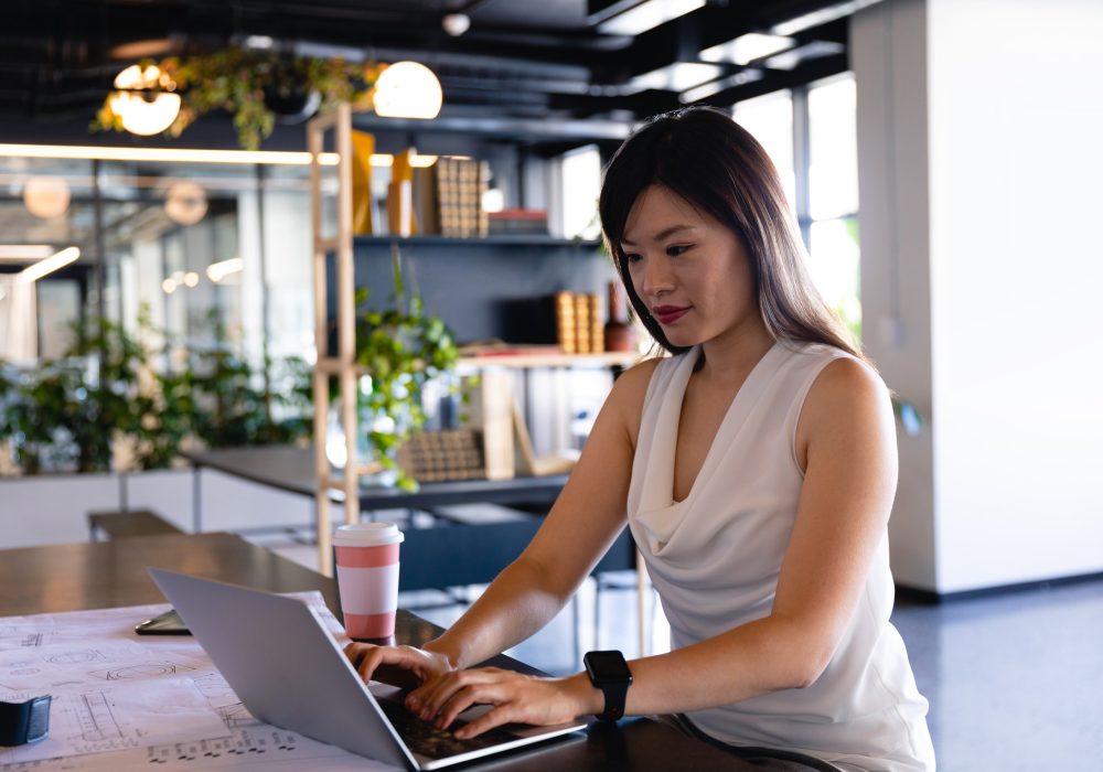 Asian business woman working in office